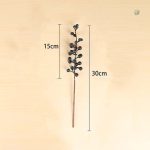 Éléments de décoration avec baies artificielles en branches