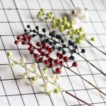 Baies décoratives artificielles sur tiges pour intérieur