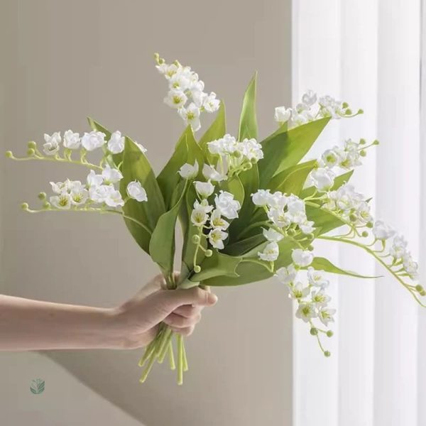 Composition de fleurs artificielles en tissu