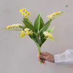Arrangement floral en tissu de muguet