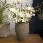 Branche artificielle de fleurs de Magnolia