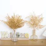 Branche décorative en or pour aménagement intérieur