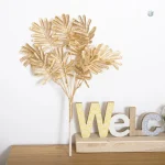 Branche dorée pour décoration florale