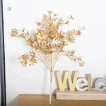 Branche décorative en or pour événements