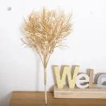 Branche artificielle dorée pour mariage
