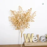 Branche dorée pour décoration de Noël