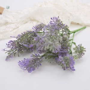 Branche de verdure artificielle pour embellir l'espace