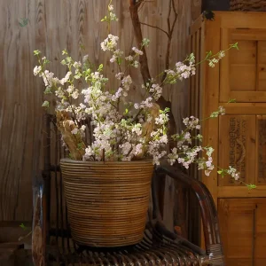 Branche de fleurs artificielles délicates