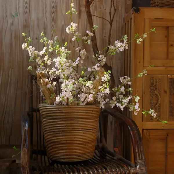Branche de fleurs artificielles délicates
