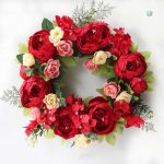 Couronne de fleurs avec pivoines en rose doux