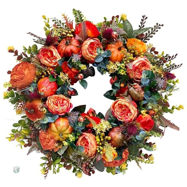 Couronne automnale avec fleurs et citrouilles colorées