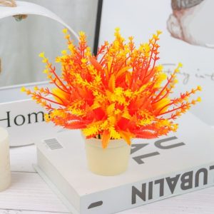 Fleur artificielle orange en décoration intérieure