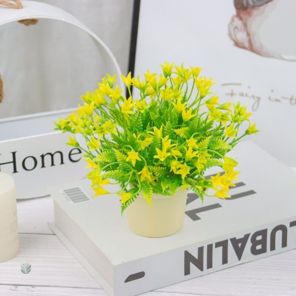 Fleurs artificielles en pot pour ambiance chaleureuse