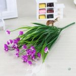 Fleurs artificielles élégantes pour décoration intérieure