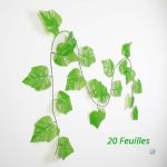 Décoration murale avec guirlande de feuilles artificielles