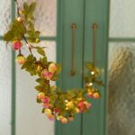 Guirlande décorative aux fleurs lumineuses et colorées