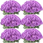 Fleurs artificielles roses pour centre de table