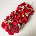 Fleurs rouges artificielles pour décoration murale