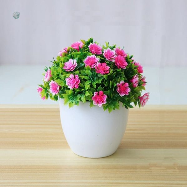 Petite plante artificielle en pot décoratif