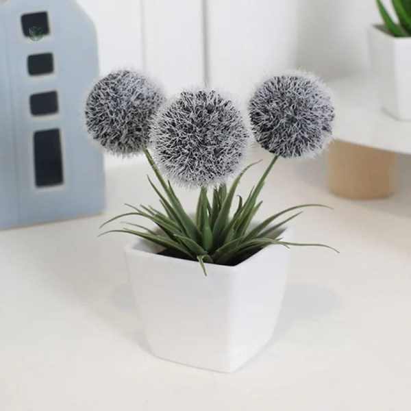 Fleurs synthétiques colorées en pot tendance