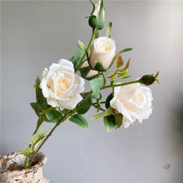 Fleurs artificielles roses pour arrangements floraux